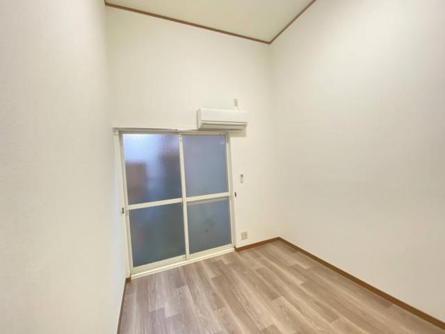プチグレイス塚口弐番館の居間写真