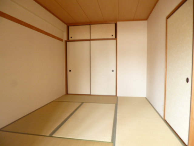ボンヌール伊丹の寝室写真