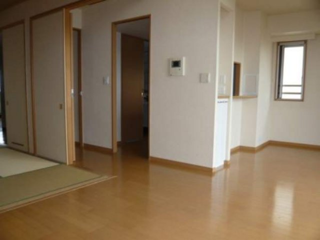 ジオメゾン新千里東町の居間写真