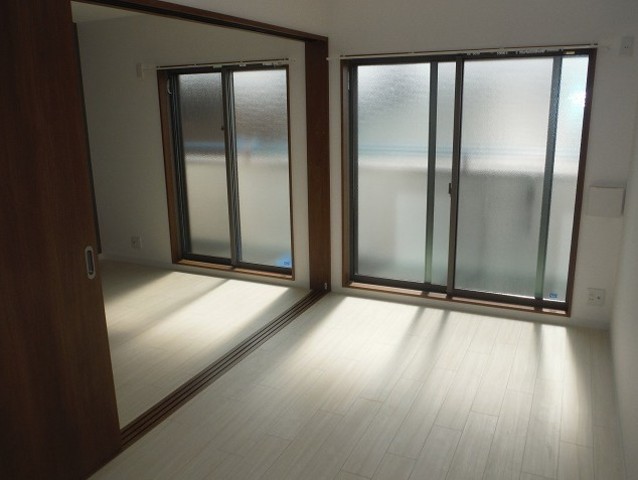 阪急千里線 吹田駅 徒歩5分 3階建 築10年の居間写真