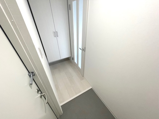 フィユフラッツ豊津Luxeの玄関写真