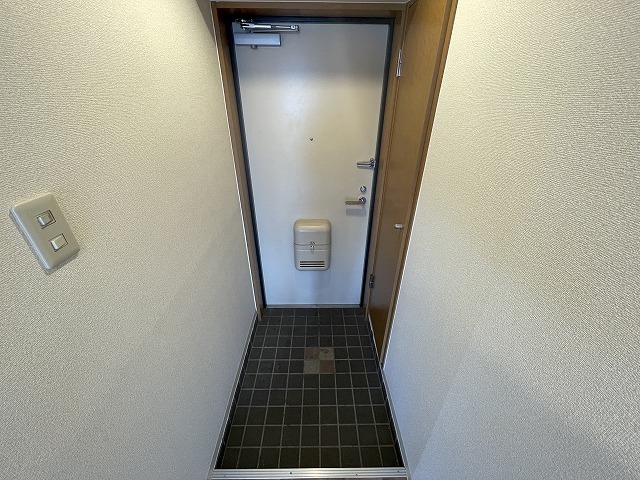 Y'sコート蘭びっくの玄関写真