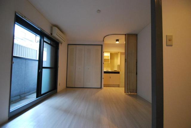 ベストレジデンス寝屋川の居間写真