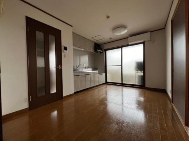 ハイツT’Sの居間写真