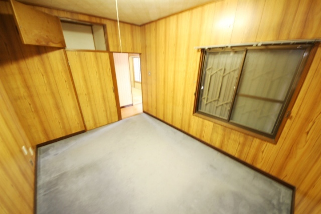 公園前東安堵戸建の居間写真