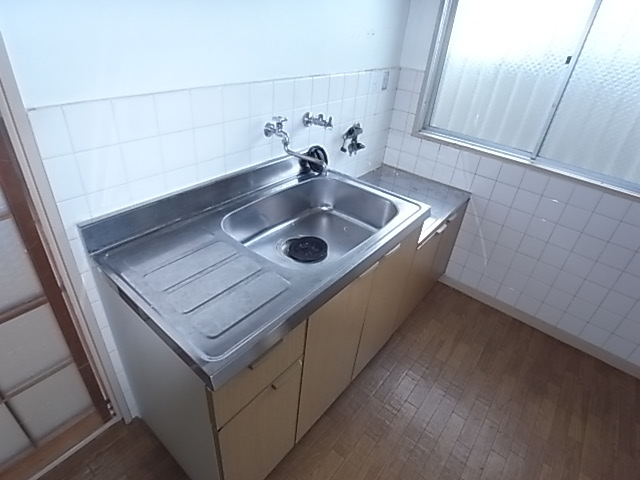 新堂マンションのキッチン写真