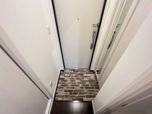 アビタ青木駅前の玄関写真