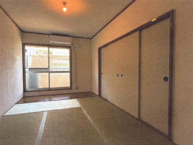 友田町3丁目テラスハウスの居間写真