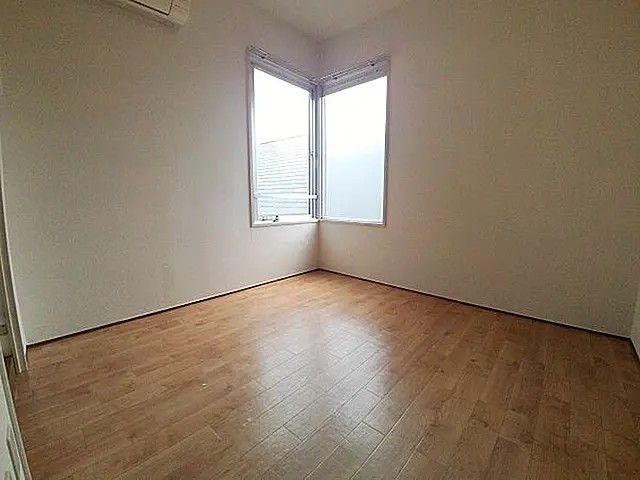 メイプル壱番館の居間写真