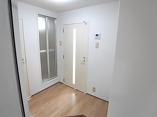 メイプル壱番館の居間写真