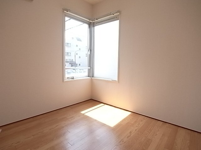 メイプル壱番館の居間写真