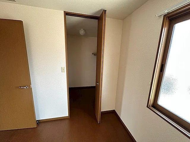 松山タウンハウスの寝室写真