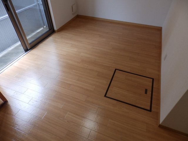 コンフォール高羽の居間写真