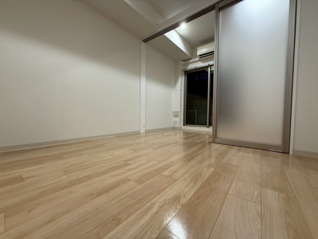 プレサンス堺筋本町駅前の居間写真