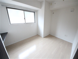 グランルージュ谷町六丁目の居間写真