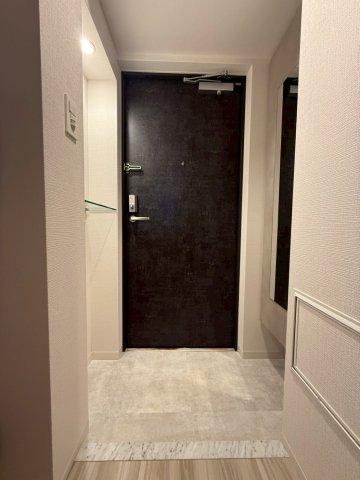 エスリードレジデンス大阪福島シティスクエアの玄関写真