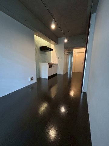 ロイヤルメゾンMINAMISENBAの居間写真