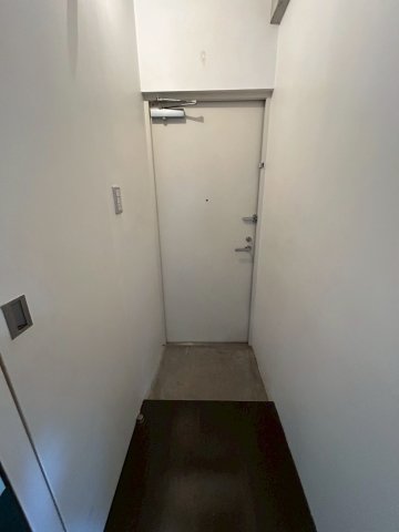 ロイヤルメゾンMINAMISENBAの玄関写真