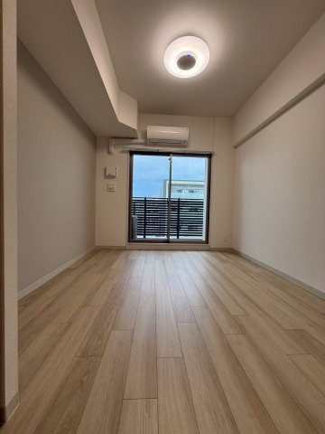 プレサンス堺筋本町エグゼブランの居間写真
