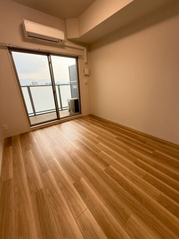 プレサンス深江橋ラヴィゲートの居間写真