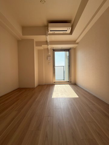 ファーストフィオーレ難波南アルマの居間写真