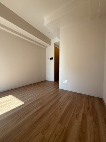 ファーストフィオーレ難波南アルマの居間写真
