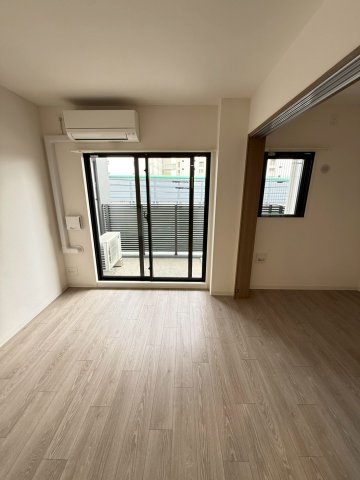 プランドール新北野の居間写真