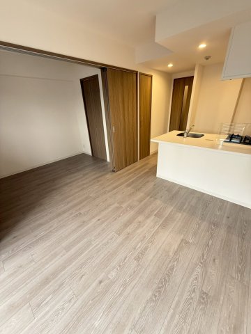 プランドール新北野の居間写真