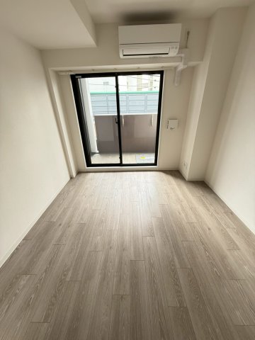プランドール新北野の居間写真