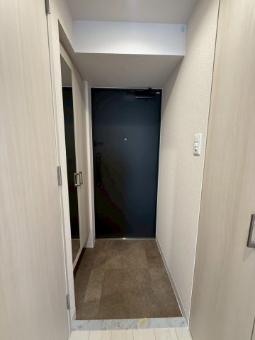ファーストフィオーレ十三エリオの玄関写真