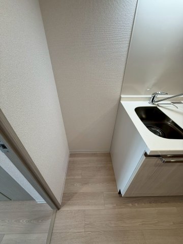 ファーストフィオーレ十三エリオのキッチン写真