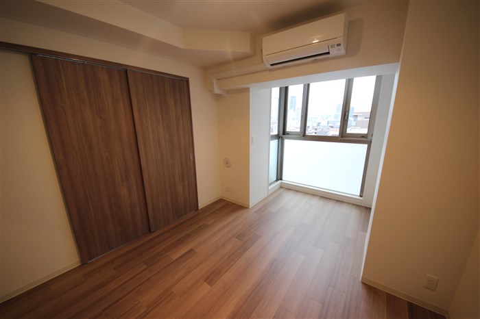 プレサンス松屋町グレースの居間写真