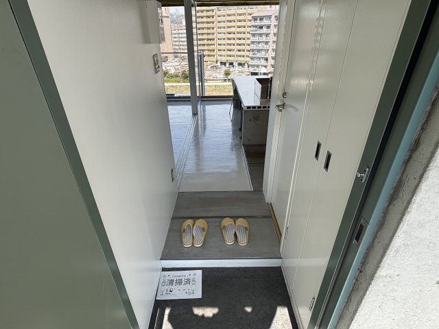 デザイナーズマンションWANARIの玄関写真